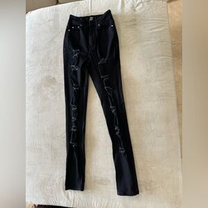 Vibrant black ripped jeans